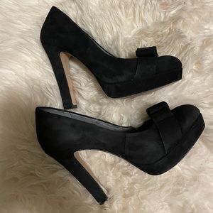 Black suede pumps